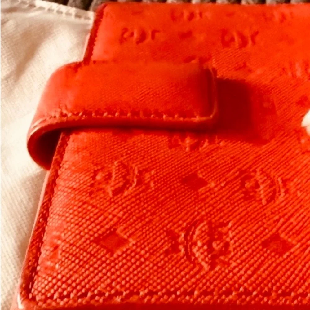 MCM Embossed Leather Compact Wallet